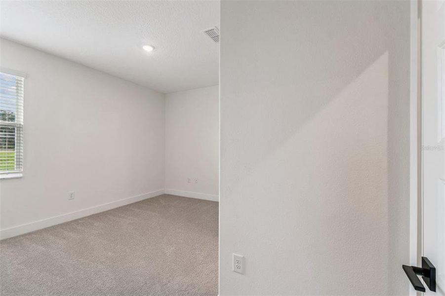 Spacious, unfurnished interior of a new home in Hidden Ridge, New Port Richey (Image 63).