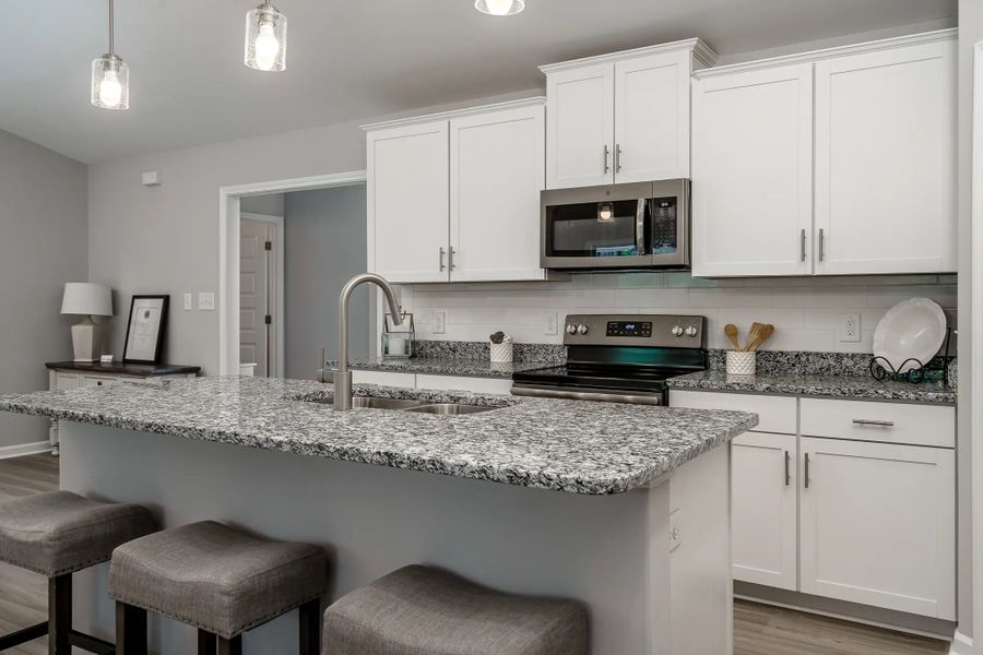Representative furnished interior of a home built from the Chatham A by JC Jackson Homes,LLC in Heritage Pointe, Newport (Image 5).