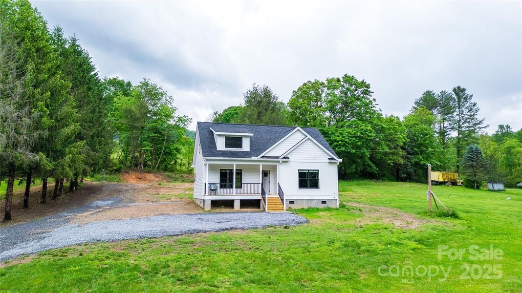 Front exterior of a new home in , Tuckasegee, NC, highlighting curb appeal (Image 19).
