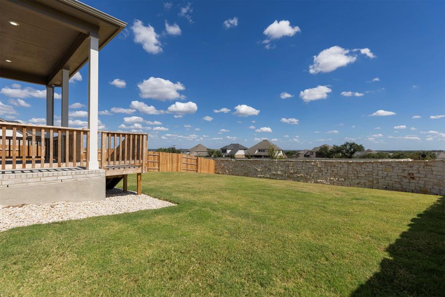 View of fenced backyard