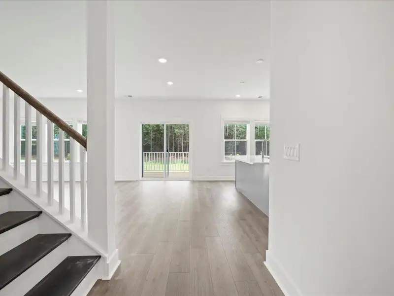 Spacious, unfurnished interior of a new home in The Coves at Lakes of Cane Bay, Summerville (Image 19). Spacious, unfurnished interior of a new home in The Coves at Lakes of Cane Bay, Summerville (Image 19).