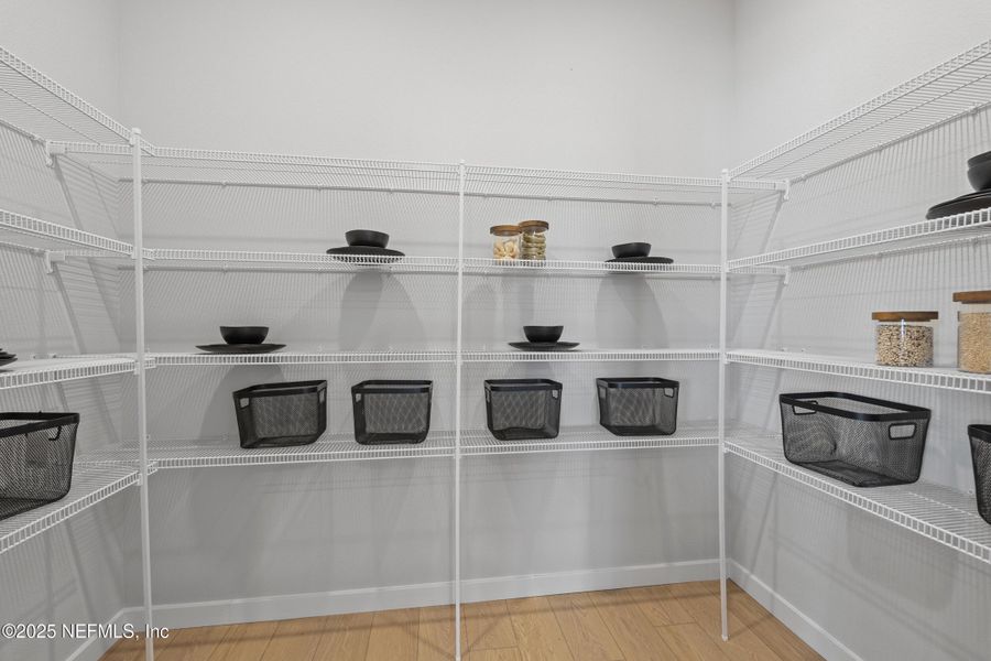 Furnished interior view inside a new home in The Cypress Series at Reserve East, Flagler Beach (Image 33).