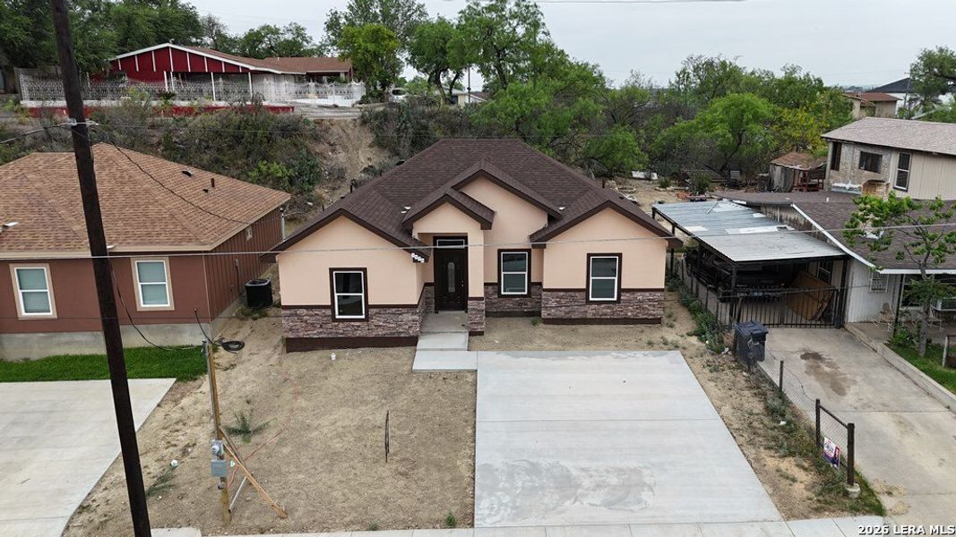 Front exterior of a new home in , Eagle Pass, TX, highlighting curb appeal (Image 14). Front exterior of a new home in , Eagle Pass, TX, highlighting curb appeal (Image 14).