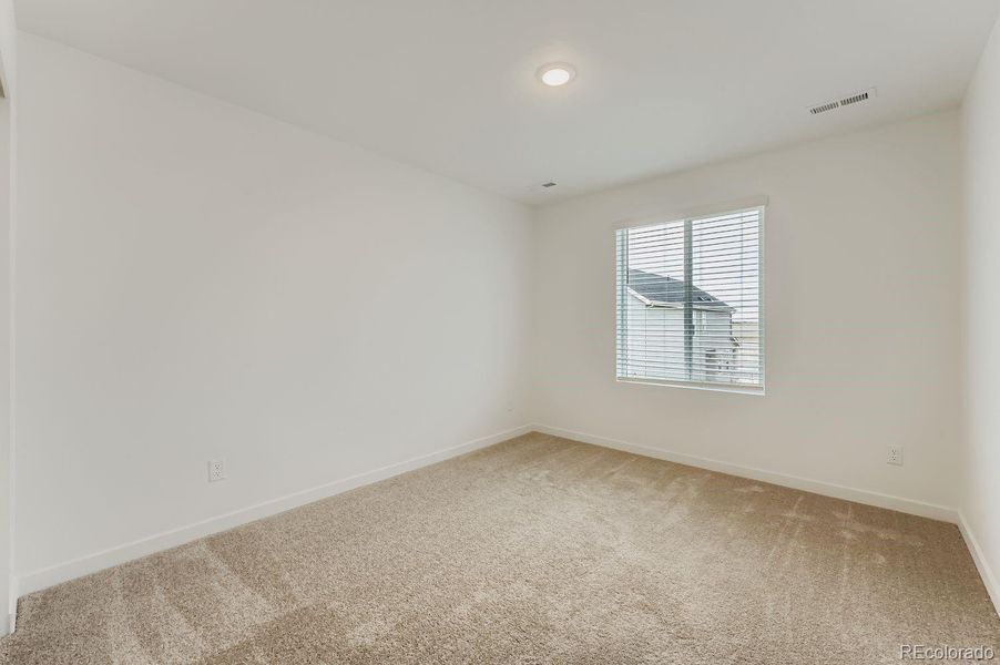 Spacious, unfurnished interior of a new home in Percheron: The Explorer Collection, Colorado Springs (Image 10).