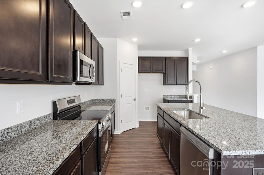 Furnished interior view inside a new home in Villas at Prestwick, Mooresville (Image 9).