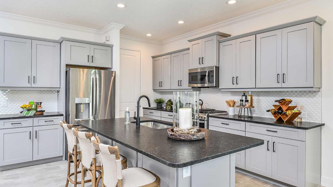Furnished interior view inside a new home in SkySail Real Estate and Homes for Sale in Naples, FL - Neal Communities, Naples (Image 11).