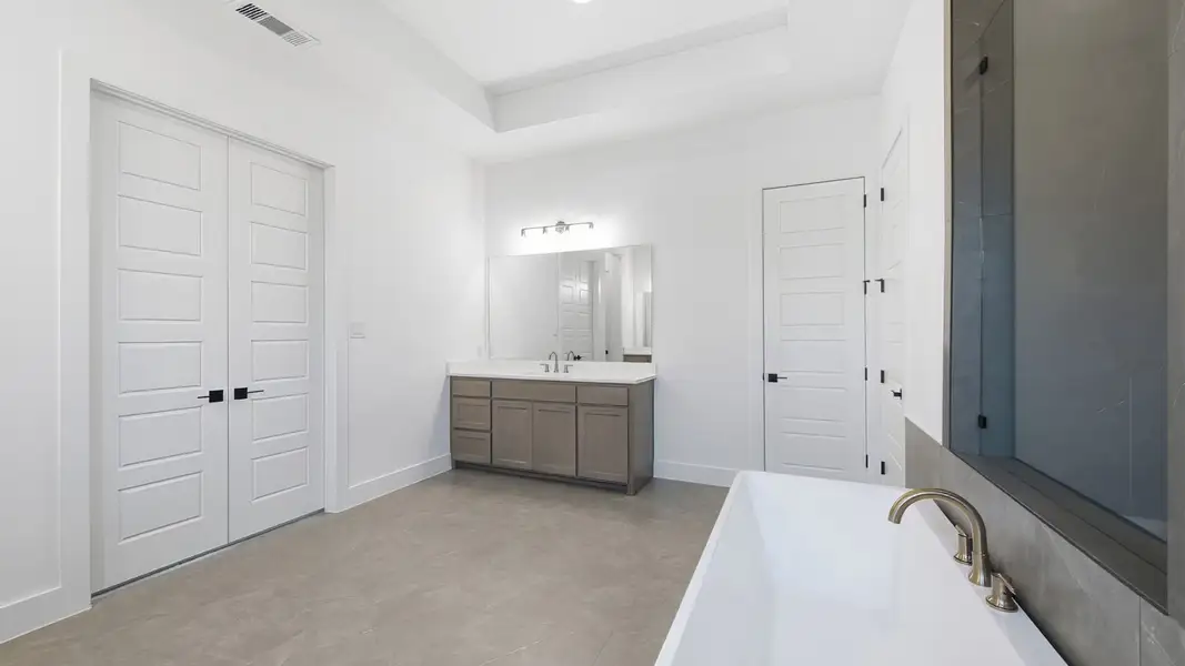 Furnished interior view inside a new home in Terraces, Rockwall (Image 14).
