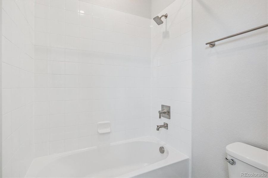 Furnished interior view inside a new home in Paired Homes at Alder Creek, Parker (Image 9).