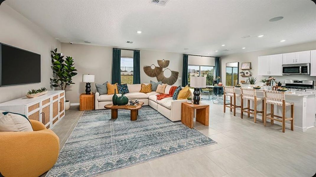 Furnished interior view inside a new home in Waterstone, Groveland (Image 13). Furnished interior view inside a new home in Waterstone, Groveland (Image 13).