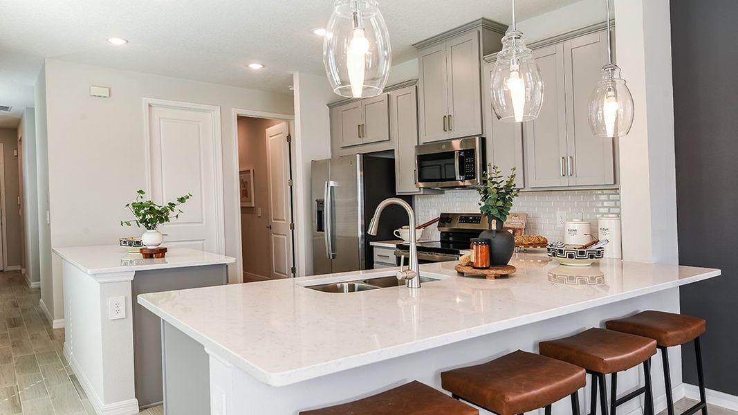 Representative furnished interior of a home built from the Saint Vincent by Taylor Morrison in Hillcrest, San Antonio (Image 4).
