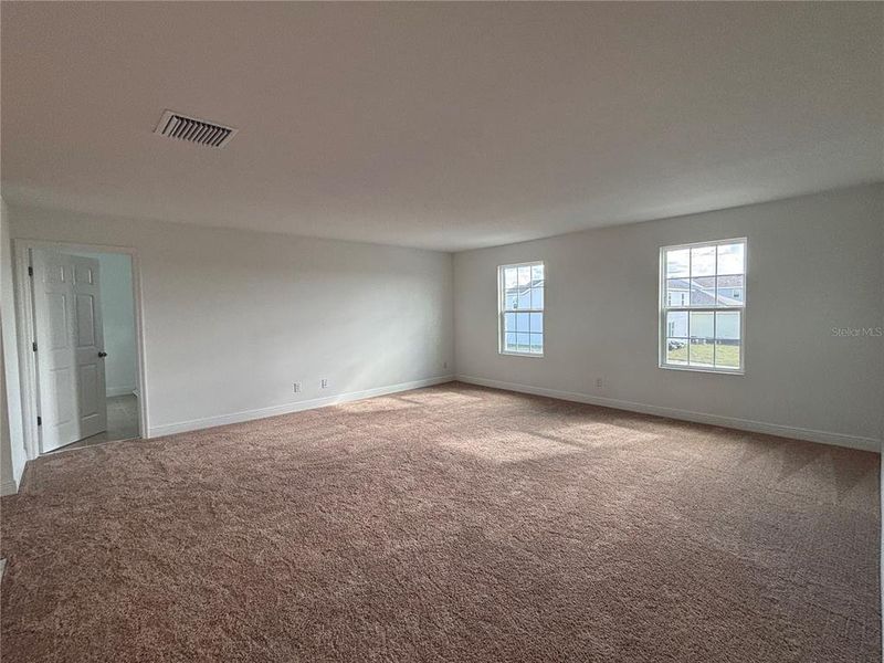 Spacious, unfurnished interior of a new home in , Groveland (Image 21).
