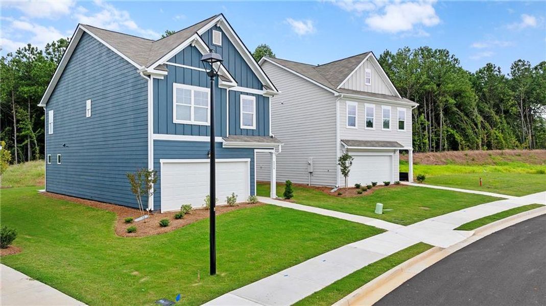 Front exterior of a new home in Walden Park – The Retreat, Jonesboro, GA, highlighting curb appeal (Image 23).
