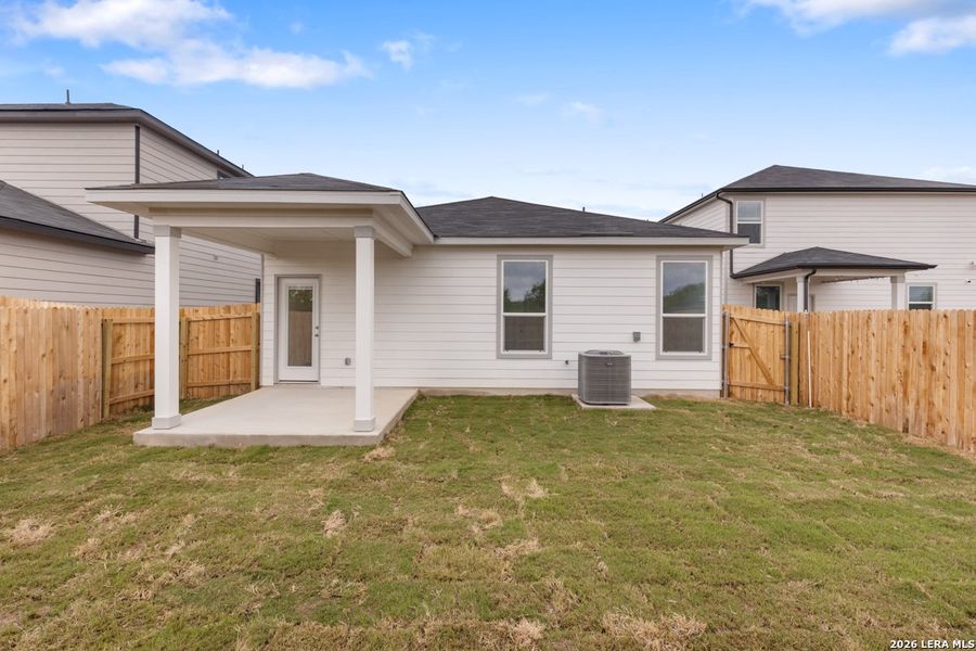 Exterior details and patio area of a home in Legend Heights, New Braunfels (Image 4).
