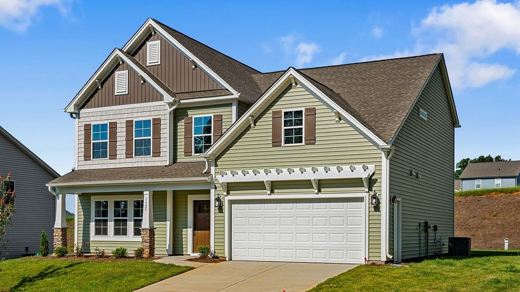 Front exterior of a new home in Brooke Hill, Lewisville, NC, highlighting curb appeal (Image 2).