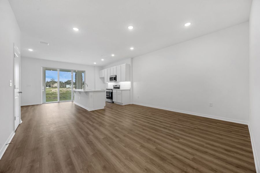 Representative unfurnished interior of a home built from the Abbey by Hartizen Homes in Shenandoah Reserve, Orlando (Image 24).