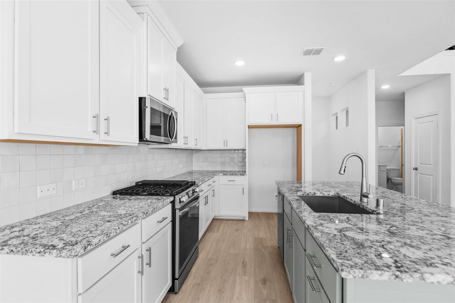 Furnished interior view inside a new home in Beamer Villas, Friendswood (Image 15).