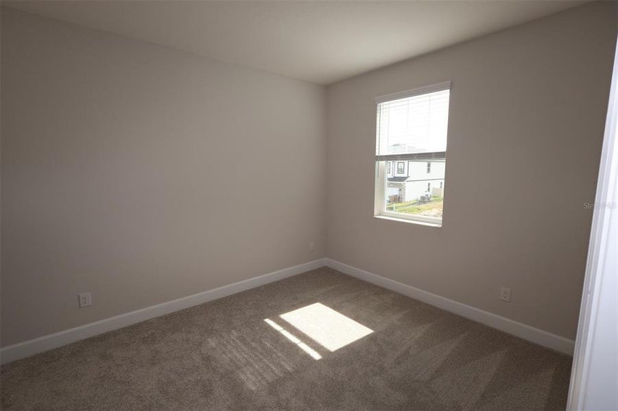 Spacious, unfurnished interior of a new home in Bay Lake Farms, St. Cloud (Image 23).