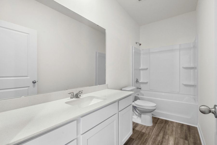 Representative furnished interior of a home built from the Europa by Starlight Homes in Oakfield Lakes, Parrish (Image 10).