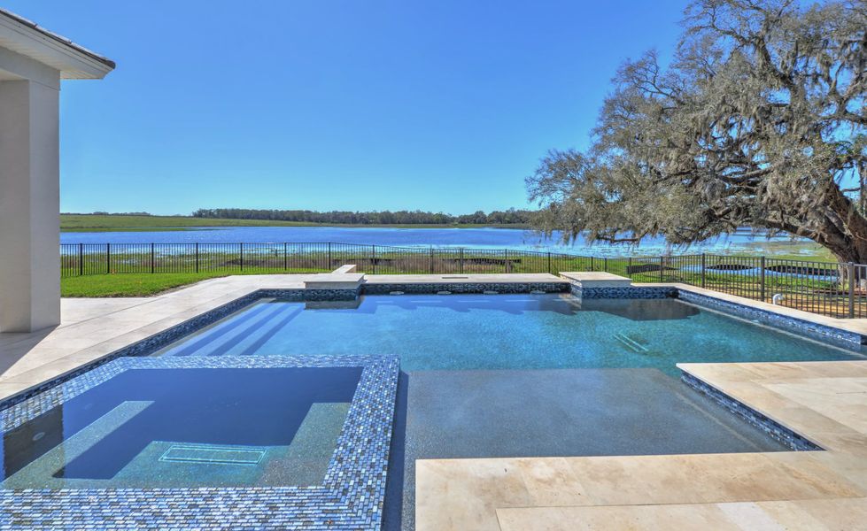Exterior details and patio area of a home in West Hill Estates, Dade City (Image 29).
