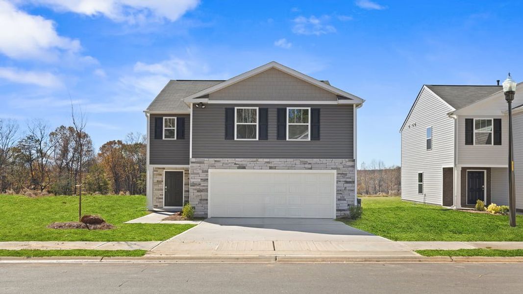 Front exterior of a new home in Cloverdale Hills, Piedmont, SC, highlighting curb appeal (Image 1).