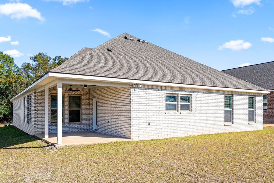 Exterior details and patio area of a home in Young Oaks, Crestview (Image 3).