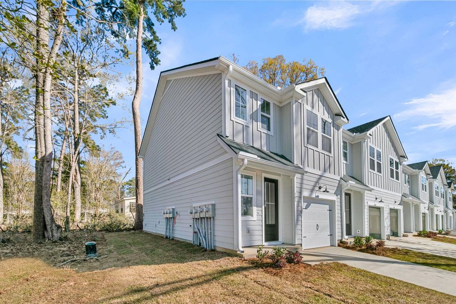 Front exterior of a new home in , Summerville, SC, highlighting curb appeal (Image 2). Front exterior of a new home in , Summerville, SC, highlighting curb appeal (Image 2).
