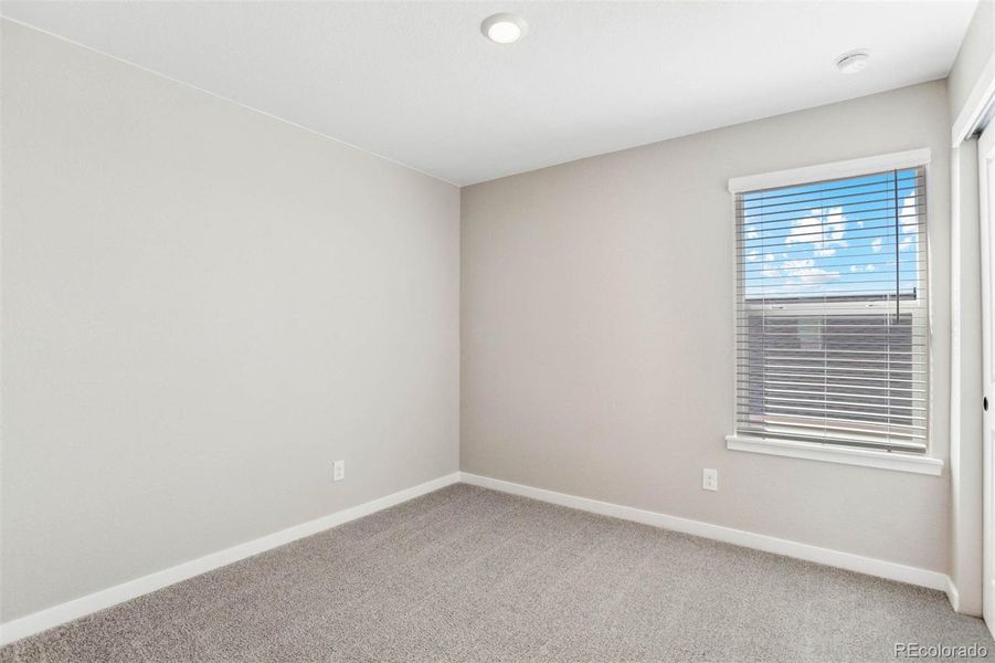 Spacious, unfurnished interior of a new home in Second Creek Farm, Commerce City (Image 13).