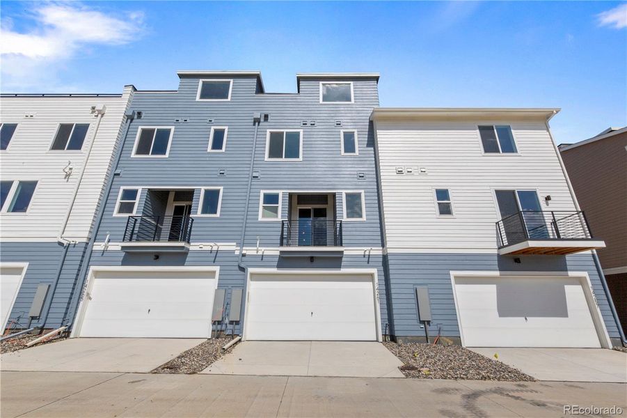 Front exterior of a new home in Dillon Pointe - Skyview, Broomfield, CO, highlighting curb appeal (Image 15).