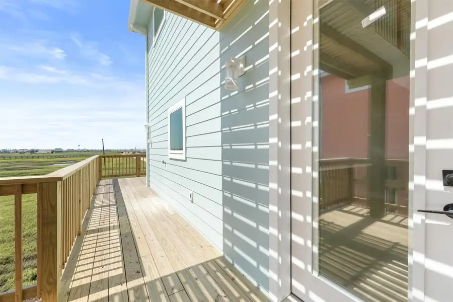 8-ft glass entry door fills the home with natural light and frames scenic views. 8-ft glass entry door fills the home with natural light and frames scenic views.
