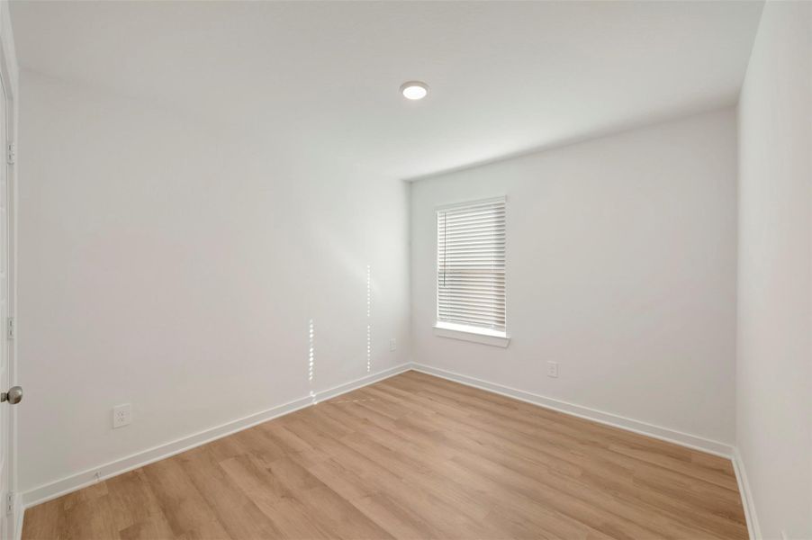 Spacious, unfurnished interior of a new home in Pinewood at Grand Texas, New Caney (Image 23).