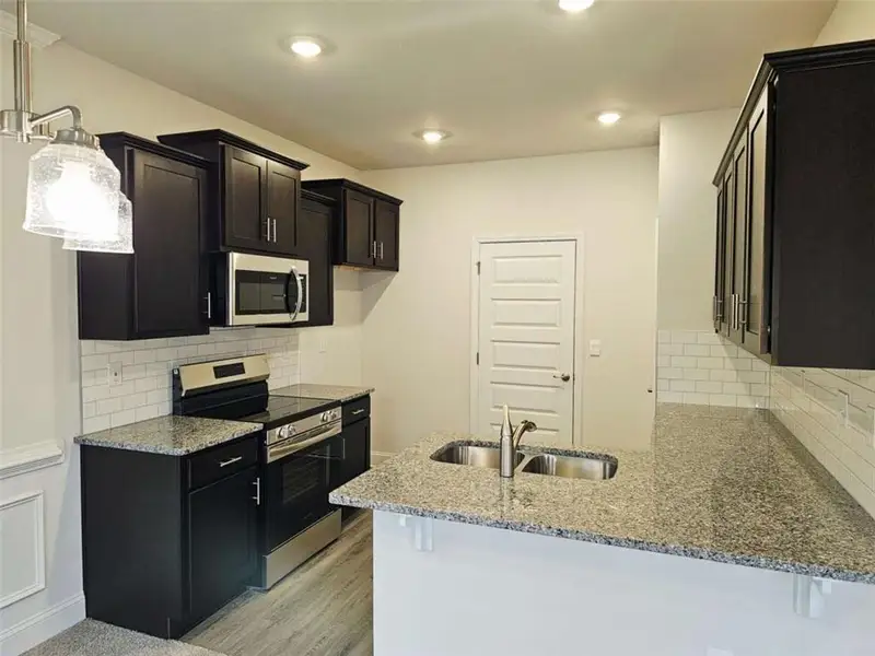 Furnished interior view inside a new home in Scarlett Place, Bowdon (Image 3).