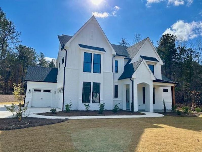 Front exterior of a new home in , Jefferson, GA, highlighting curb appeal (Image 28).