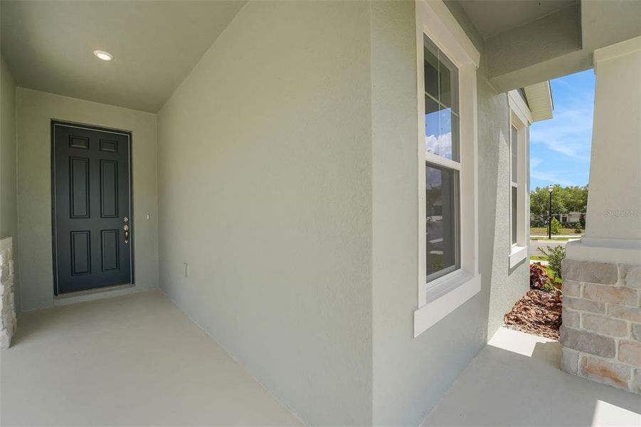 Exterior details and patio area of a home in Tuscan Hills, Dade City (Image 3).