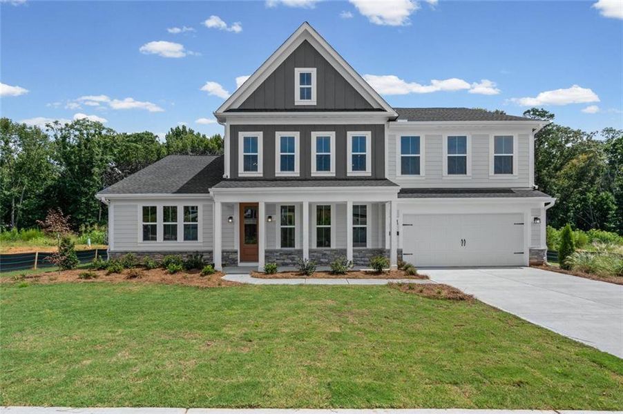 Front exterior of a new home in Hidden Fields, Hoschton, GA, highlighting curb appeal (Image 20).
