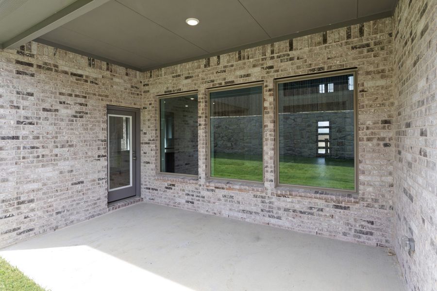 Exterior details and patio area of a home in Park Hills, Rockwall (Image 3). Exterior details and patio area of a home in Park Hills, Rockwall (Image 3).