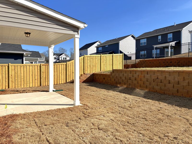 Exterior details and patio area of a home in Holly Ridge, Greenville (Image 3).