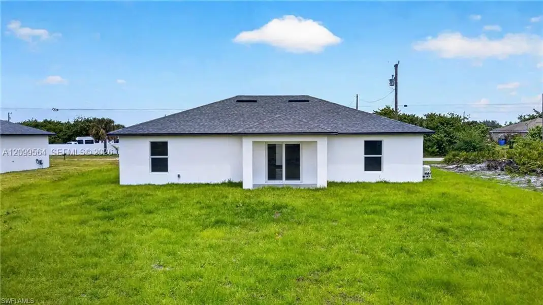 Exterior details and patio area of a home in , Lehigh Acres (Image 3).