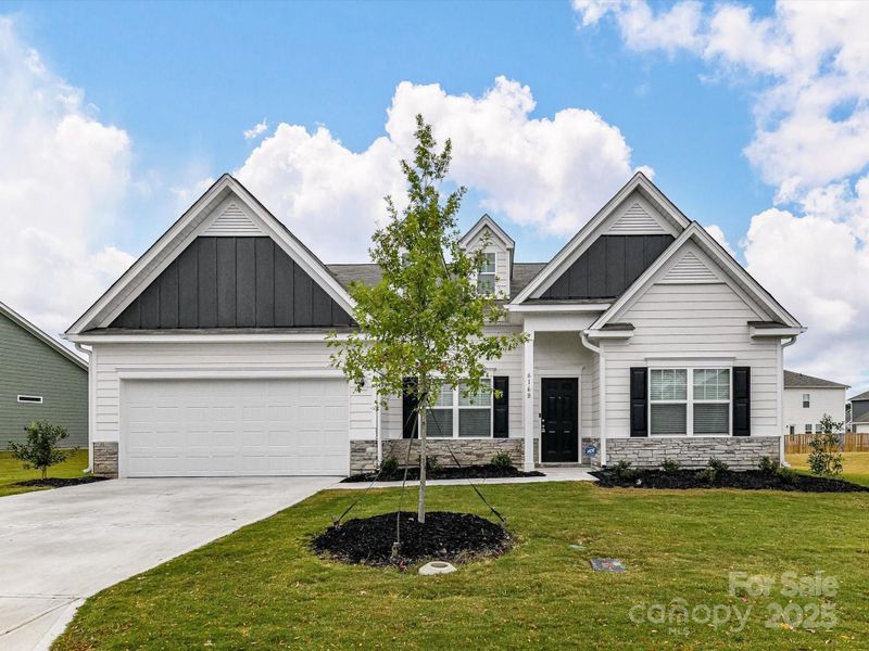 Front exterior of a new home in , Midland, NC, highlighting curb appeal (Image 1).