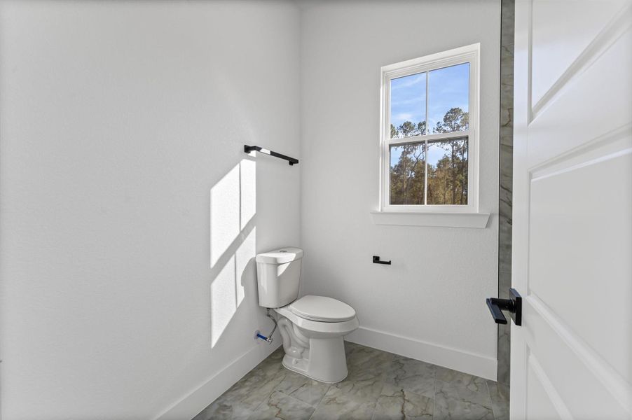 Furnished interior view inside a new home in , Conroe (Image 17).