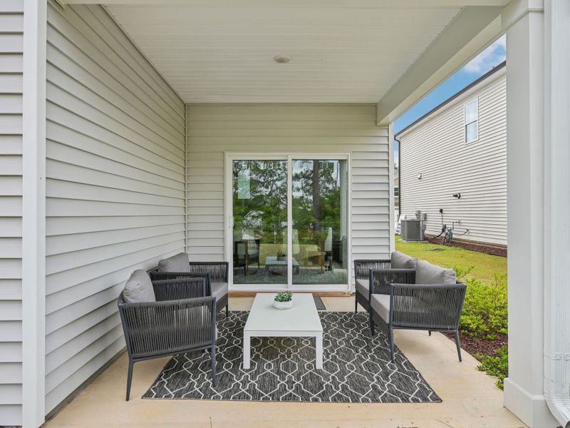 Exterior details and patio area of a home in Oak Manor - Signature Series, Garner (Image 2).