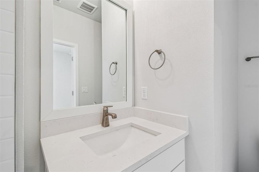 Furnished interior view inside a new home in Towns at Union, St. Petersburg (Image 6).