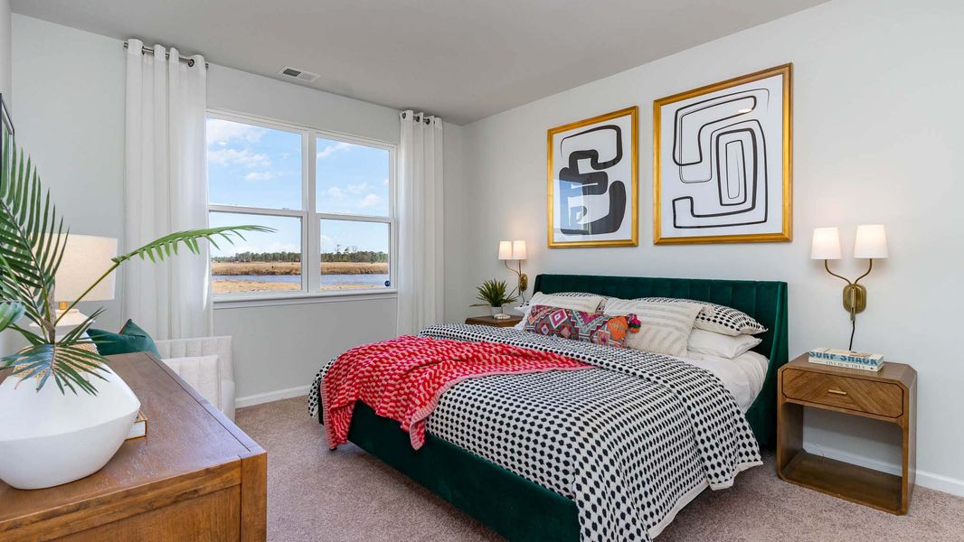 Representative furnished interior of a home built from the CALI by D.R. Horton in Sandridge Park, Little River (Image 18).