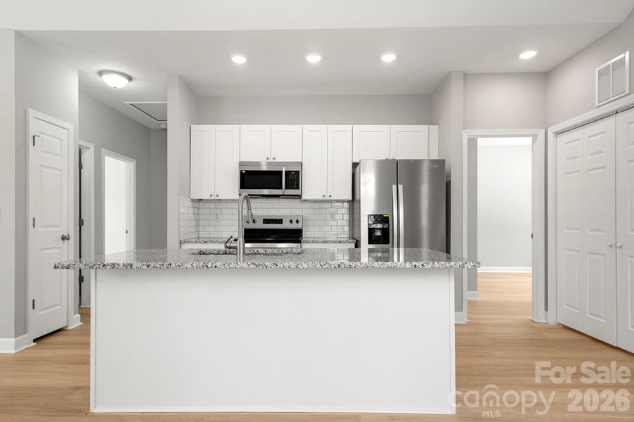 Furnished interior view inside a new home in , Statesville (Image 7).