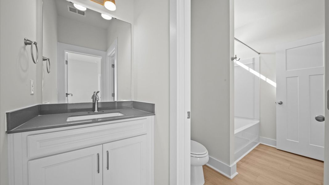 Furnished interior view inside a new home in Pinebrook, Woodruff (Image 37).