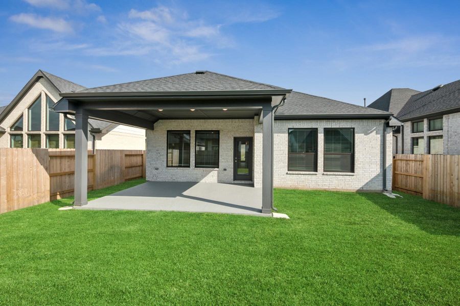 Exterior details and patio area of a home in Audubon 45' Homesites, Magnolia (Image 3).