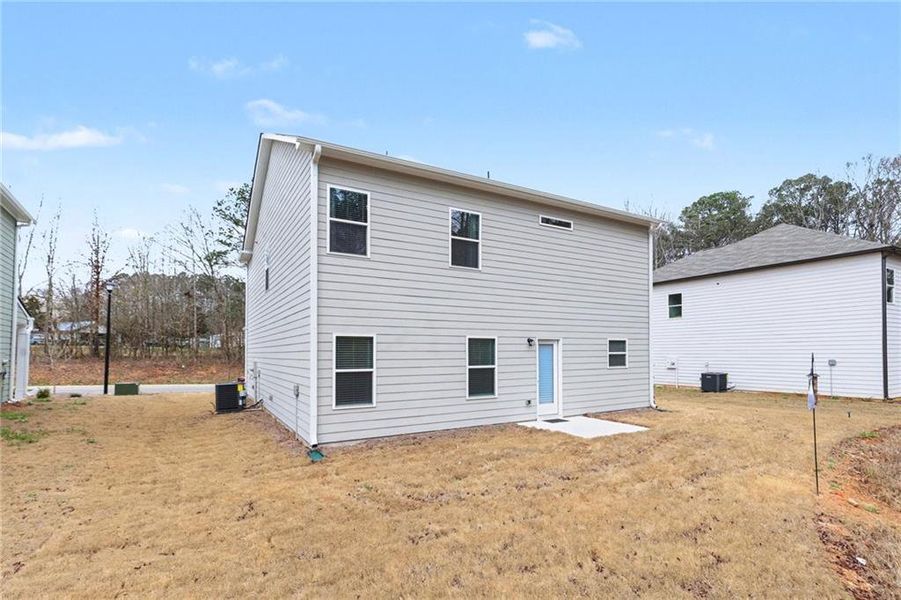 Exterior details and patio area of a home in Morgan Landing, Carrollton (Image 4).