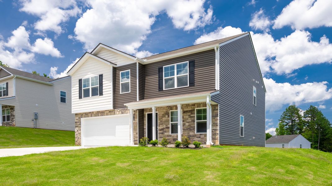 Front exterior of a new home in Byrd Farms, Dayton, TN, highlighting curb appeal (Image 2). Front exterior of a new home in Byrd Farms, Dayton, TN, highlighting curb appeal (Image 2).