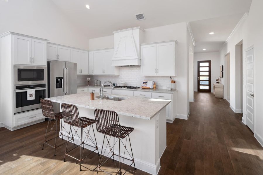 Representative furnished interior of a home built from the The Trinity Executive by UnionMain Homes in Lake Breeze, Lavon (Image 8).