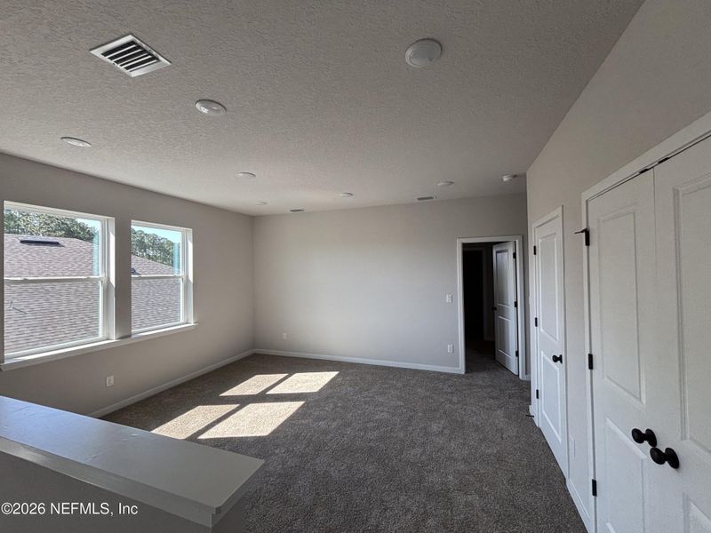 Spacious, unfurnished interior of a new home in Reserve East, Flagler Beach (Image 21).