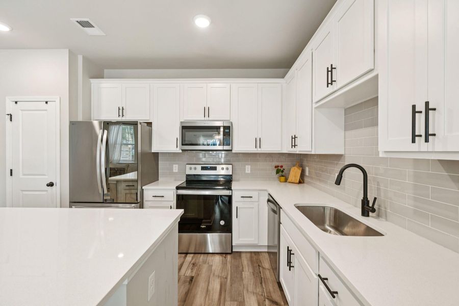 Furnished interior view inside a new home in , North Charleston (Image 9).